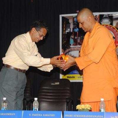 Managing Trustee Welcoming Swamiji With Fruit Basket