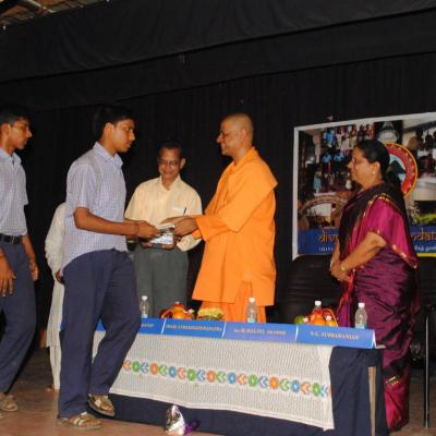 Swamiji Presenting The Books To The Students Of Pshs School